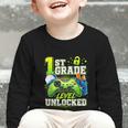 Back To School 1st First Grade Level Unlocked Gamer Kid Graphic Toddler Long Sleeve Tee