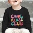 Cool Paras Club Paraprofessional Groovy Back To School Graphic Toddler Long Sleeve Tee Cool Paras Club Paraprofessional Groovy Back To School Graphic Toddler Long Sleeve Tee