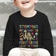 First Grade Graduation Dinosaur Dino Back To School Student Graphic Toddler Long Sleeve Tee First Grade Graduation Dinosaur Dino Back To School Student Graphic Toddler Long Sleeve Tee