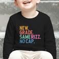 Gen Z Back To School New Grade Same Rizz No Cap Graphic Toddler Long Sleeve Tee Gen Z Back To School New Grade Same Rizz No Cap Graphic Toddler Long Sleeve Tee