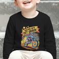 Motocross Dirt Bike Back To School Racing Into 1st Grade Graphic Toddler Long Sleeve Tee Motocross Dirt Bike Back To School Racing Into 1st Grade Graphic Toddler Long Sleeve Tee