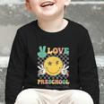 Peace Love Preschool Smile Face Back To School PRESCHOOL Graphic Toddler Long Sleeve Tee