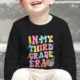 Retro Groovy In My Third Grade Era First Day Back To School Graphic Toddler Long Sleeve Tee Retro Groovy In My Third Grade Era First Day Back To School Graphic Toddler Long Sleeve Tee