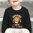 Roaring Into First Grade Lion 1st Grade Back To School Graphic Toddler Long Sleeve Tee Roaring Into First Grade Lion 1st Grade Back To School Graphic Toddler Long Sleeve Tee