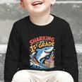 Sharking Into 1st Grade Back To School Shark Graphic Toddler Long Sleeve Tee Sharking Into 1st Grade Back To School Shark Graphic Toddler Long Sleeve Tee