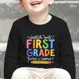 Watch Out First Grade Here I Come 1St Grade Back To School Graphic Toddler Long Sleeve Tee