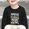 Women's Helping Little Minds Grow Back To School Apparel Graphic Toddler Long Sleeve Tee Women's Helping Little Minds Grow Back To School Apparel Graphic Toddler Long Sleeve Tee