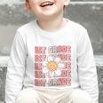 70s Groovy 1st Grade Back To School First Day Of First Grade Graphic Toddler Long Sleeve Tee 70s Groovy 1st Grade Back To School First Day Of First Grade Graphic Toddler Long Sleeve Tee