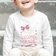 Back To School Cute Pink Coquette Girls Hello Second Grade Graphic Toddler Long Sleeve Tee Back To School Cute Pink Coquette Girls Hello Second Grade Graphic Toddler Long Sleeve Tee