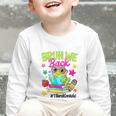 Bruh We Back Third Grade Cute Frog Back To School Graphic Toddler Long Sleeve Tee Bruh We Back Third Grade Cute Frog Back To School Graphic Toddler Long Sleeve Tee
