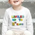 Leveled Up To 5th Grade Back To School Kids Boys Premium Tri-Blend Graphic Toddler Long Sleeve Tee Leveled Up To 5th Grade Back To School Kids Boys Premium Tri-Blend Graphic Toddler Long Sleeve Tee