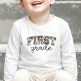 Retro First Grade Old Camo Back To School Boy Girl 1st Grade Graphic Toddler Long Sleeve Tee Retro First Grade Old Camo Back To School Boy Girl 1st Grade Graphic Toddler Long Sleeve Tee