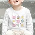 Retro Groovy Back To School Coquette First Day Of School Graphic Toddler Long Sleeve Tee