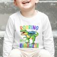Roaring Into Kindergarten DinosaurRex Back To School Boys Performance Graphic Toddler Long Sleeve Tee Roaring Into Kindergarten DinosaurRex Back To School Boys Performance Graphic Toddler Long Sleeve Tee