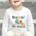 Steppin Into Fourth Grade Back To School First Day 4th Grade Graphic Toddler Long Sleeve Tee