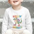T Rex Rollin Into Kindergarten Back To School First Day Boys Graphic Toddler Long Sleeve Tee T Rex Rollin Into Kindergarten Back To School First Day Boys Graphic Toddler Long Sleeve Tee