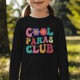 Cool Paras Club Paraprofessional Groovy Back To School Graphic Toddler Long Sleeve Tee Cool Paras Club Paraprofessional Groovy Back To School Graphic Toddler Long Sleeve Tee