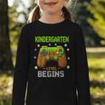 First Day Of Kindergarten Level Begins Back To School Graphic Toddler Long Sleeve Tee First Day Of Kindergarten Level Begins Back To School Graphic Toddler Long Sleeve Tee