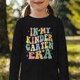 Kindergarten Era Happy Back To School Groovy Kids Boys Girls Graphic Toddler Long Sleeve Tee Kindergarten Era Happy Back To School Groovy Kids Boys Girls Graphic Toddler Long Sleeve Tee