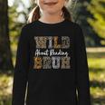 Wild About Reading Kid Love Wild Animal Books Back To School Graphic Toddler Long Sleeve Tee Wild About Reading Kid Love Wild Animal Books Back To School Graphic Toddler Long Sleeve Tee