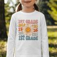 Retro 1st Grade Daisy Colorful Back To School First Grade Graphic Toddler Long Sleeve Tee Retro 1st Grade Daisy Colorful Back To School First Grade Graphic Toddler Long Sleeve Tee