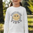 Retro First Grade Vibes Smile Face Back To School 1st Grade Graphic Toddler Long Sleeve Tee