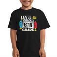 First Day Of 6th Grade Level Unlocked Game Back To School Graphic Kid T-Shirt First Day Of 6th Grade Level Unlocked Game Back To School Graphic Kid T-Shirt