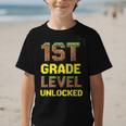 First Day Of 1st Grade Level Unlocked Back To School For Boy Graphic Kid T-Shirt First Day Of 1st Grade Level Unlocked Back To School For Boy Graphic Kid T-Shirt