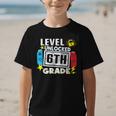 First Day Of 6th Grade Level Unlocked Game Back To School Graphic Kid T-Shirt First Day Of 6th Grade Level Unlocked Game Back To School Graphic Kid T-Shirt