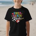 First Grade Rocks Colorful Back To School Guitar Graphic Kid T-Shirt First Grade Rocks Colorful Back To School Guitar Graphic Kid T-Shirt