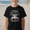 A Reader Without Their Book Is a Tragedy Back To School Graphic Kid T-Shirt A Reader Without Their Book Is a Tragedy Back To School Graphic Kid T-Shirt
