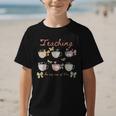 Teaching Is My Cup Of Tea Coquette Bow Floral Back To School Graphic Kid T-Shirt Teaching Is My Cup Of Tea Coquette Bow Floral Back To School Graphic Kid T-Shirt