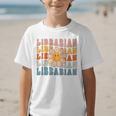 Librarian Retro Find Me At The Library Back To School Graphic Kid T-Shirt Librarian Retro Find Me At The Library Back To School Graphic Kid T-Shirt
