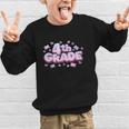 First Day Of 4th Grade Girls Coquette Bow Back To School Graphic Kid Sweatshirt First Day Of 4th Grade Girls Coquette Bow Back To School Graphic Kid Sweatshirt