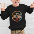 Groovy Enrollment Secretary Back To School Graphic Kid Sweatshirt Groovy Enrollment Secretary Back To School Graphic Kid Sweatshirt