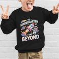 To Kindergarten And Beyond Astronaut Back To School Graphic Kid Sweatshirt To Kindergarten And Beyond Astronaut Back To School Graphic Kid Sweatshirt