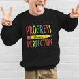 Motivational Quotes Back To School Progress Over Perfection Graphic Kid Sweatshirt Motivational Quotes Back To School Progress Over Perfection Graphic Kid Sweatshirt
