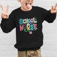 School Nurse Colorful Costume Back To School Nursing Job Graphic Kid Sweatshirt School Nurse Colorful Costume Back To School Nursing Job Graphic Kid Sweatshirt
