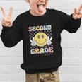 Second Grade Team Smile Face 2nd Grade Back To School Graphic Kid Sweatshirt
