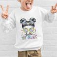 Hello 1st Grade Messy Bun Girl Back To School First Day Graphic Kid Sweatshirt Hello 1st Grade Messy Bun Girl Back To School First Day Graphic Kid Sweatshirt