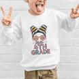 Hello 4th Grade Messy Bun Hair Back To School Girls Graphic Kid Sweatshirt Hello 4th Grade Messy Bun Hair Back To School Girls Graphic Kid Sweatshirt