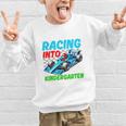Racing Into Kindergarten Race Car Driver Back To School Performance Graphic Kid Sweatshirt Racing Into Kindergarten Race Car Driver Back To School Performance Graphic Kid Sweatshirt
