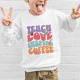 Teach Love Inspire Coffee Cute Teaching Quote Back To School Graphic Kid Sweatshirt Teach Love Inspire Coffee Cute Teaching Quote Back To School Graphic Kid Sweatshirt