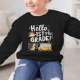 Cute Hello 1st Grade Dinosaur School Back To School Dino Bus Graphic Kid Sweatshirt Cute Hello 1st Grade Dinosaur School Back To School Dino Bus Graphic Kid Sweatshirt