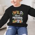Wild About Preschool Back To School Jungle Theme Classroom Graphic Kid Sweatshirt Wild About Preschool Back To School Jungle Theme Classroom Graphic Kid Sweatshirt