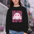 Groovy First Grade Dream Team Back To School 1st Grade Squad Youth Crewneck Sweatshirt Groovy First Grade Dream Team Back To School 1st Grade Squad Youth Crewneck Sweatshirt
