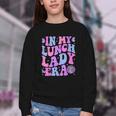 Groovy In My Lunch Lady Era Cafeteria Back To School Youth Crewneck Sweatshirt Groovy In My Lunch Lady Era Cafeteria Back To School Youth Crewneck Sweatshirt