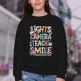 Lights Camera Teach Smile Back To School Awesome Learners Youth Crewneck Sweatshirt Lights Camera Teach Smile Back To School Awesome Learners Youth Crewneck Sweatshirt