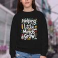 Women's Helping Little Minds Grow Back To School Apparel Youth Crewneck Sweatshirt Women's Helping Little Minds Grow Back To School Apparel Youth Crewneck Sweatshirt