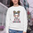 Hello 4th Grade Messy Bun Hair Back To School Girls Youth Crewneck Sweatshirt Hello 4th Grade Messy Bun Hair Back To School Girls Youth Crewneck Sweatshirt